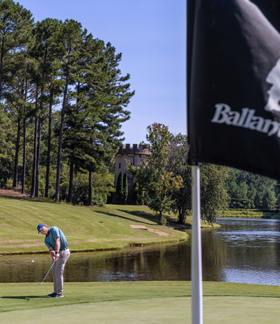 A man plays golf at Ballantrae Golf Club.