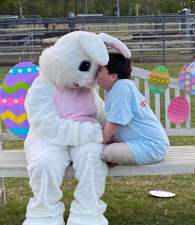 Easter Bunny and Child on Easter themed bench